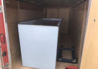 inside of red utility trailer